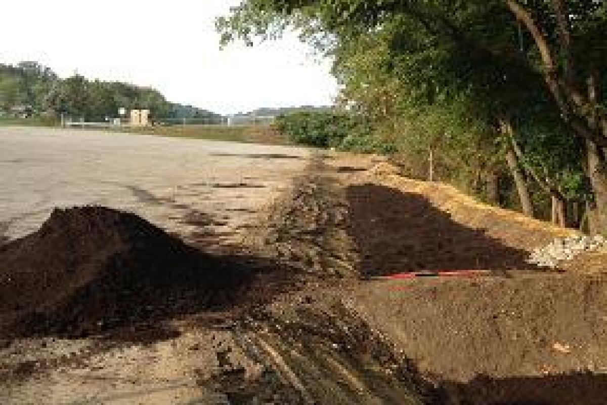 Compost Is Placed, Leveled and Being Tilled